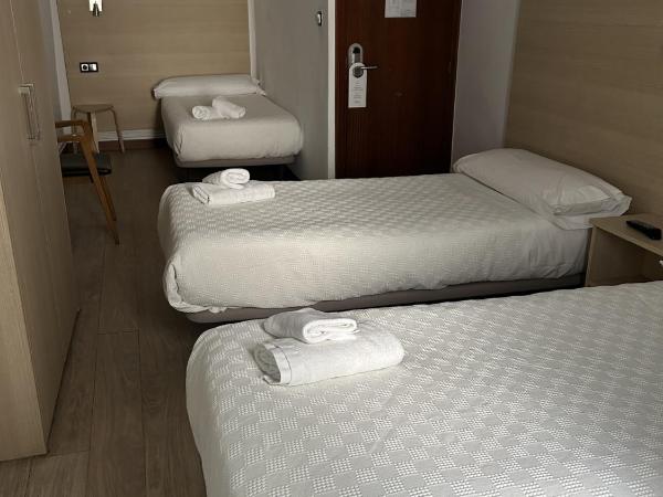 Casa OTANO : photo 2 de la chambre chambre triple avec 3 lits simples