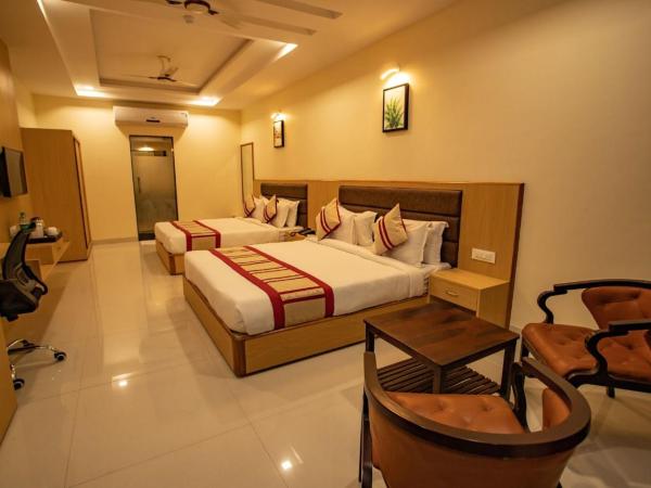 Hotel Aarunya Royale : photo 2 de la chambre chambre familiale