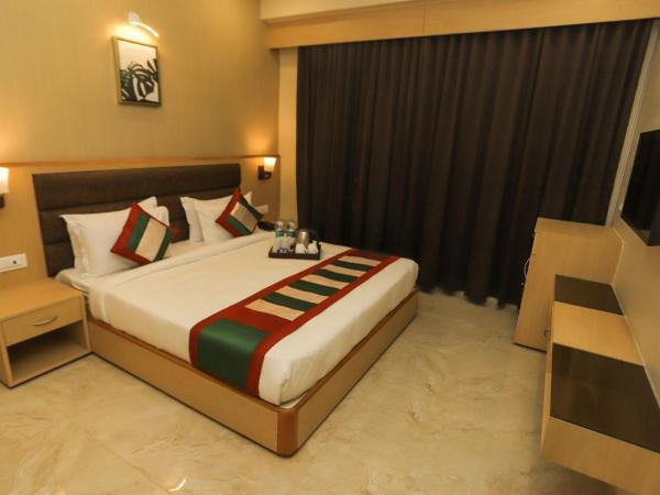 Hotel Aarunya Royale : photo 1 de la chambre suite