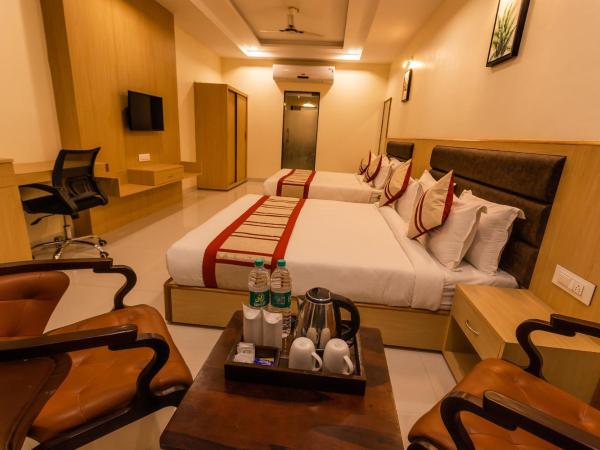 Hotel Aarunya Royale : photo 4 de la chambre chambre familiale