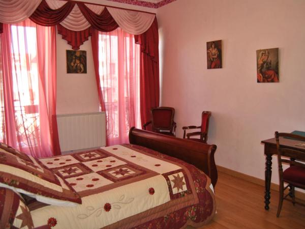 Au Pied du Chateau : photo 1 de la chambre chambre lits jumeaux