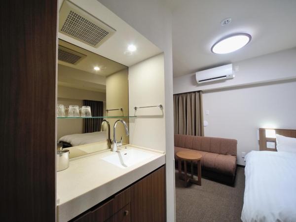 Dormy Inn Express Meguro Aobadai Hot Spring : photo 1 de la chambre chambre lits jumeaux de luxe - non-fumeurs