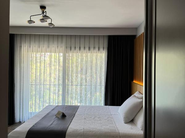 The Rest Port Argento : photo 1 de la chambre chambre double - vue sur jardin