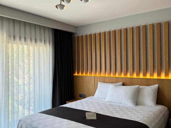 The Rest Port Argento : photo 2 de la chambre chambre double - vue sur jardin
