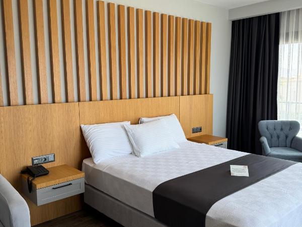 The Rest Port Argento : photo 2 de la chambre chambre double deluxe avec balcon - vue sur mer