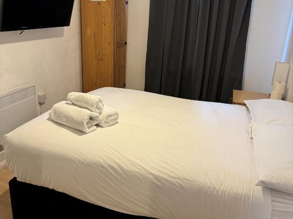 Central Comfort Rooms : photo 5 de la chambre deluxe double room with private shower and shared toilet