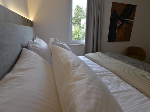 Suites Villa Ropuš : photo 7 de la chambre suite deluxe - vue latérale sur mer