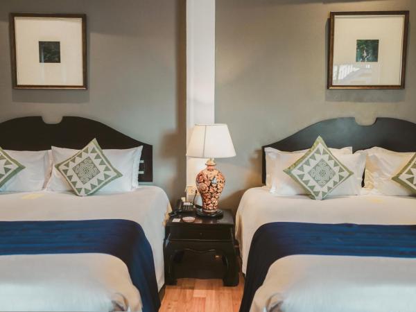 THEE Kashatharn by TH District : photo 1 de la chambre chambre familiale avec terrasse