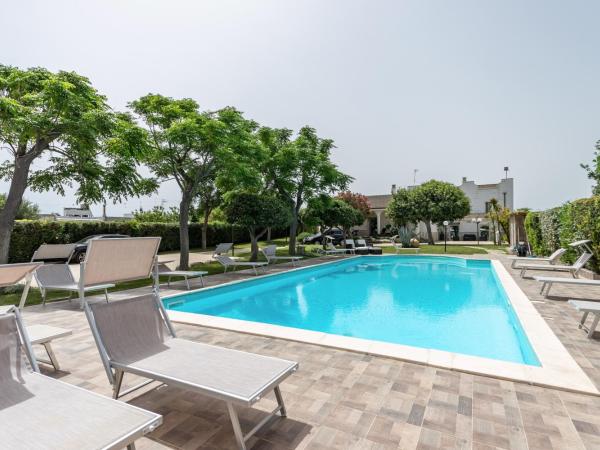 Pietramare Luxury Suites by Rentbeat : photo 2 de la chambre chambre lit queen-size avec baignoire spa