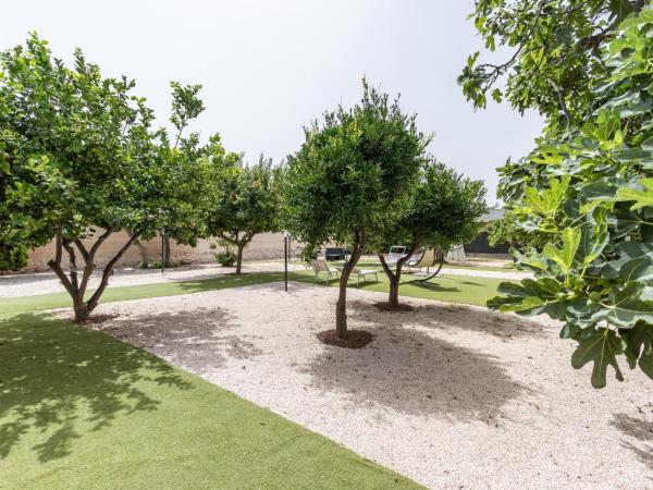 Pietramare Luxury Suites by Rentbeat : photo 9 de la chambre chambre lit queen-size avec baignoire spa