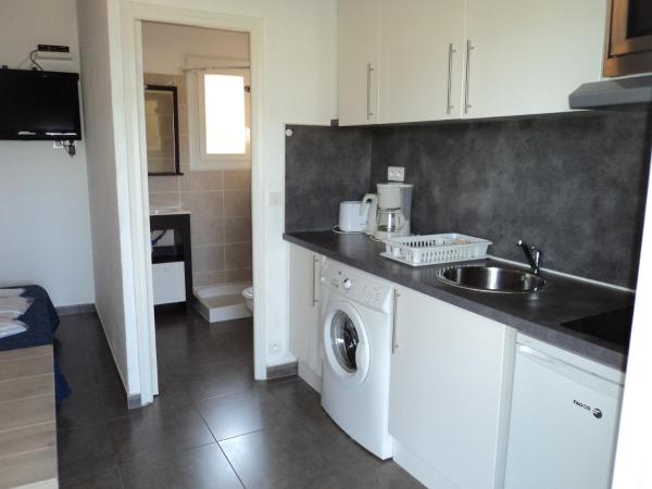 Résidence Monte d'Oro : photo 3 de la chambre studio avec vue sur jardin