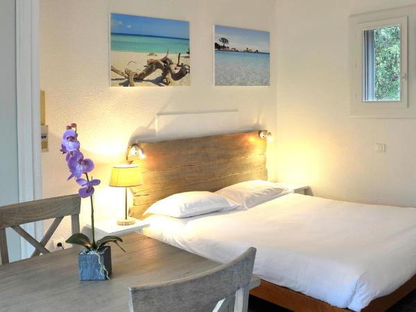 Résidence Monte d'Oro : photo 4 de la chambre studio avec vue sur jardin