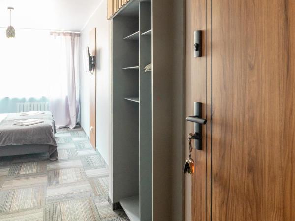 Centrum Szkoleniowo-Konferencyjne : photo 6 de la chambre chambre double ou lits jumeaux - vue sur jardin