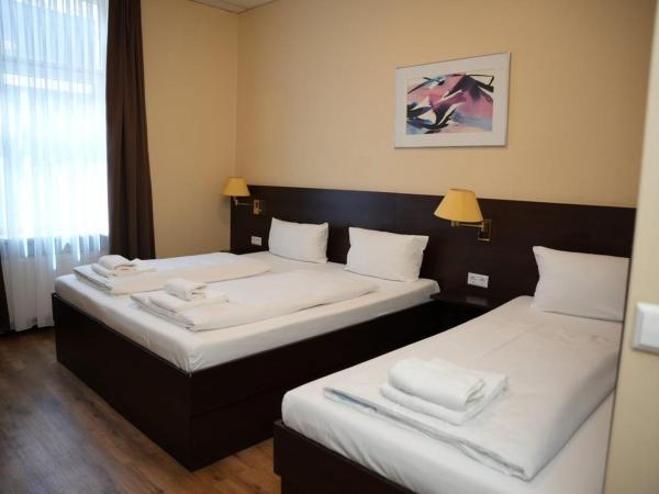 Hotel CityRing : photo 1 de la chambre chambre triple