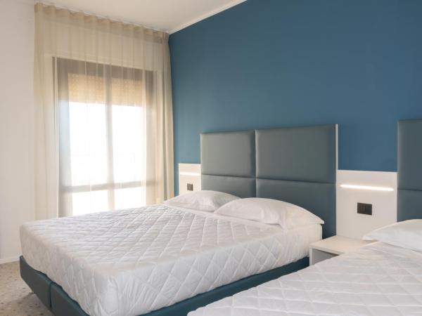 Hotel Delaville Frontemare : photo 1 de la chambre chambre triple classique