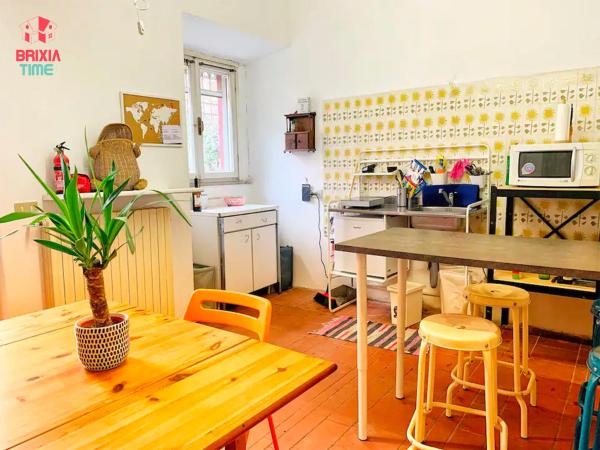 Brixia Time Case - In villa con giardino : photo 1 de la chambre chambre double avec salle de bains privative