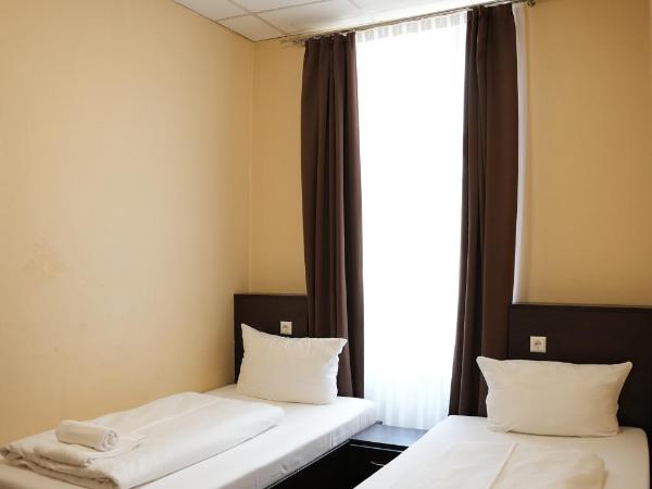 Hotel CityRing : photo 4 de la chambre chambre lits jumeaux