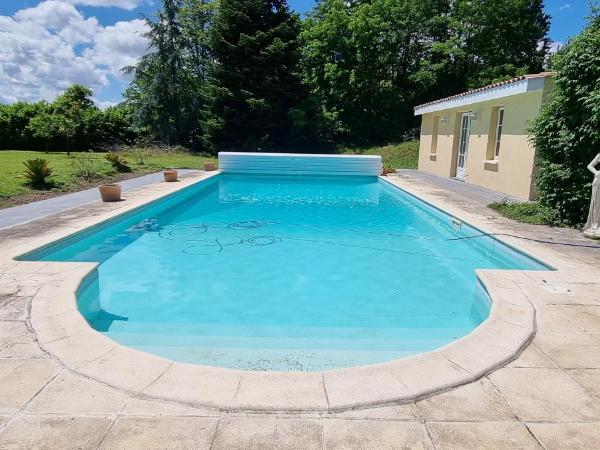 Bergerac Chambres d'hôtes Ibis d'or : photo 6 de la chambre chambre lits jumeaux - vue sur jardin