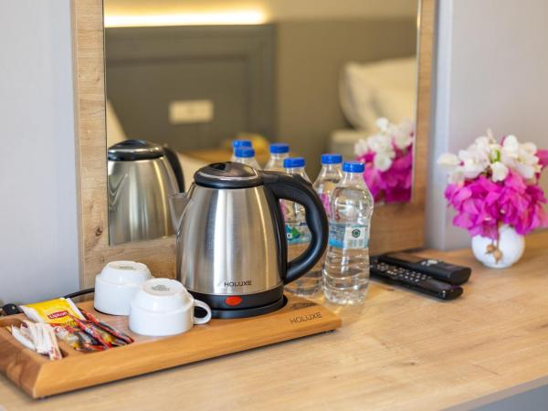 LESLION HOTEL TURUNC : photo 9 de la chambre chambre triple standard