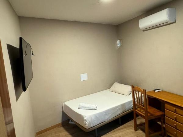 Metropolitan Atocha : photo 3 de la chambre chambre simple avec salle de bains commune