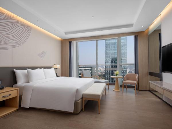 Junluxe Guangzhou Baiyun - Oversea Buyers Registration Counter and Free Shuttle Bus during Canton Fair : photo 1 de la chambre suite 1 chambre