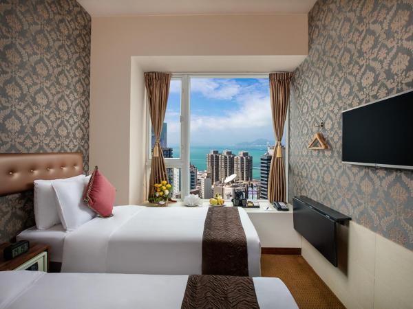 Ramada Hong Kong Harbour View : photo 1 de la chambre chambre double deluxe - vue sur port