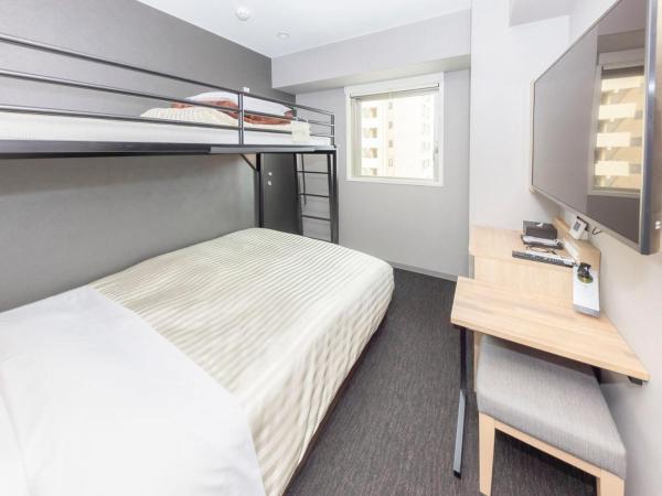 Super Hotel Sapporo Kitagojo Dori : photo 1 de la chambre chambre double ou lits jumeaux standard