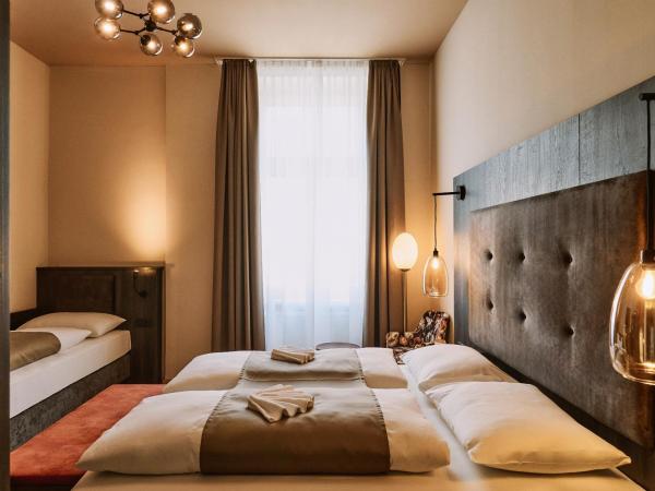 Urban Rooms Rathaus - Self Check-In : photo 5 de la chambre chambre triple supérieure