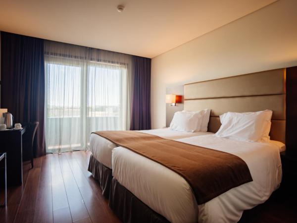 Axis Porto Business & Spa Hotel : photo 1 de la chambre chambre double/lits jumeaux avec lit d'appoint