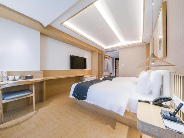 Jianguo Puyin Hotel - Xi'an Big Wild Goose Pagoda University of Science and Technology Qujiang Campus Metro Station : photo 4 de la chambre chambre lits jumeaux deluxe