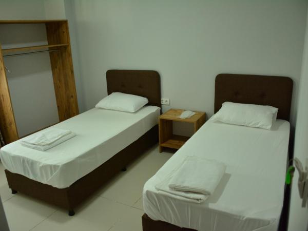 Yeşilyurt otel : photo 1 de la chambre chambre lits jumeaux Économique