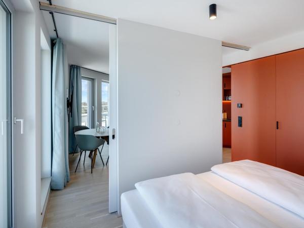 DEIN APART München : photo 4 de la chambre appartement supérieur avec balcon