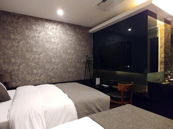 SR Hotel Sadang : photo 4 de la chambre chambre lits jumeaux de luxe 