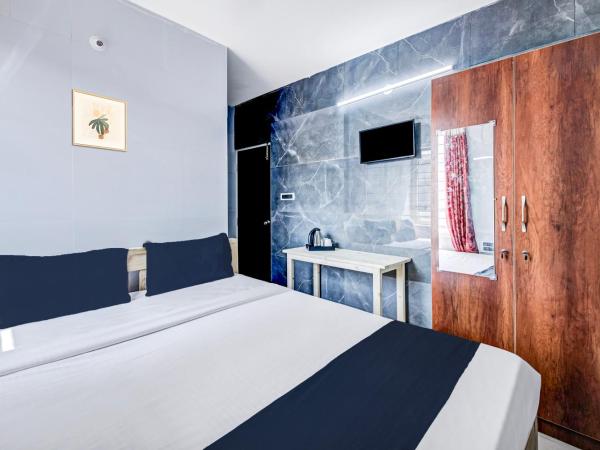 Collection O Sapthagiri Inn : photo 10 de la chambre chambre triple classique