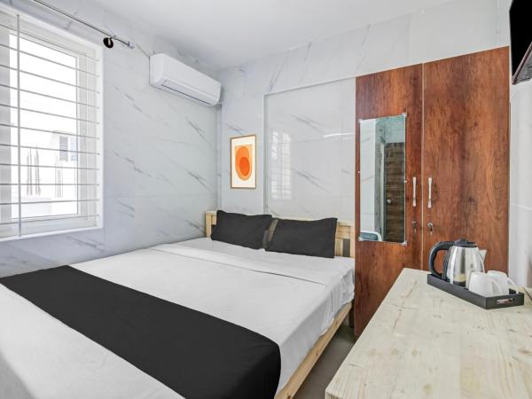 Collection O Sapthagiri Inn : photo 1 de la chambre chambre triple classique