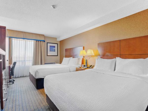 Sandman Hotel & Suites London Downtown : photo 1 de la chambre chambre avec 2 grands lits queen-size