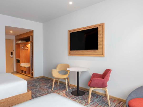 Hilton Garden Inn Guadalajara Airport : photo 1 de la chambre chambre avec 2 grands lits queen-size