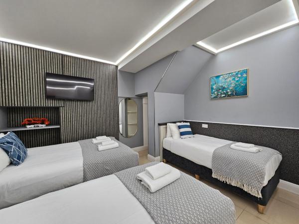 London Stay Apartments : photo 1 de la chambre chambre quadruple