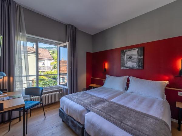 Châtonneyre Hotel & Restaurant : photo 1 de la chambre chambre lits jumeaux avec vue