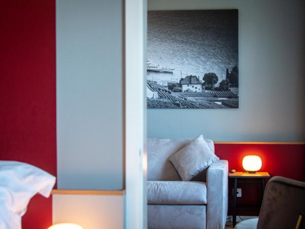 Châtonneyre Hotel & Restaurant : photo 5 de la chambre chambre familiale - vue sur lac