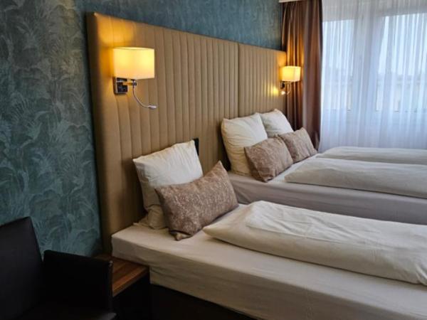 Hotel Villa Sophia : photo 2 de la chambre chambre triple