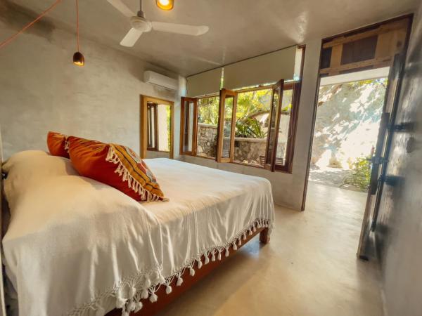 Hotel Poc Na Tulum : photo 1 de la chambre hébergement avec baignoire - vue sur jungle