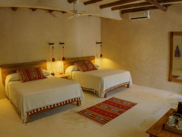 Hotel Poc Na Tulum : photo 7 de la chambre chambre lits jumeaux - vue sur jardin