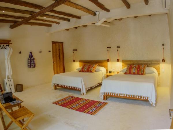 Hotel Poc Na Tulum : photo 9 de la chambre chambre lits jumeaux - vue sur jardin