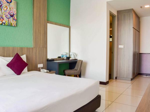 D'Wharf Hotel & Serviced Residence : photo 3 de la chambre chambre lit king-size supérieure