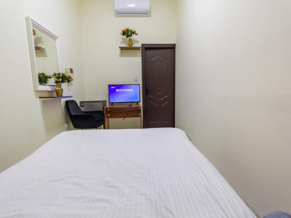 Comfortable Private Rooms in Compound Housing : photo 2 de la chambre chambre simple standard avec salle de bains commune