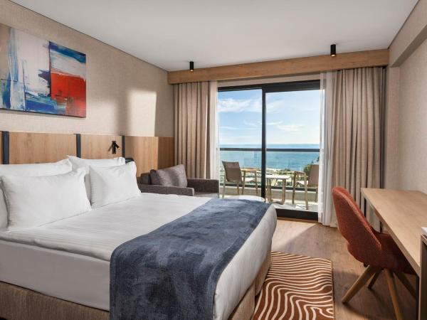 Elite World Kuşadası : photo 1 de la chambre chambre supérieure avec lit queen-size - vue sur mer