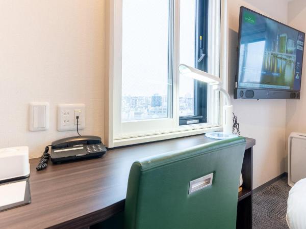 Tabist TOKYO CITY VIEW HOTEL : photo 1 de la chambre chambre triple - vue sur ville