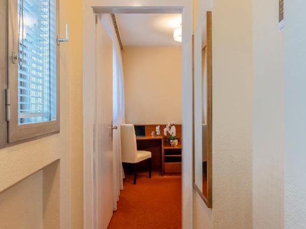 PLAZA INN Rieker Stuttgart Hauptbahnhof : photo 3 de la chambre chambre simple standard