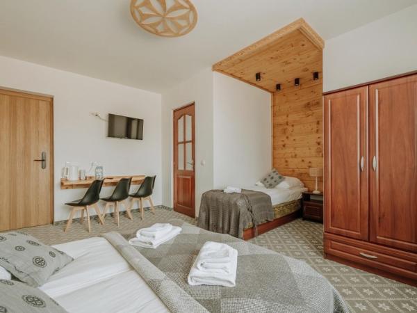 Willa Swoboda Garden Spa : photo 7 de la chambre chambre triple avec accès gratuit au spa